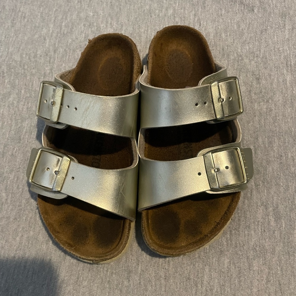 Gold metallic Birkenstock girls sandals. Size 27